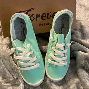 Teal slip on shoes